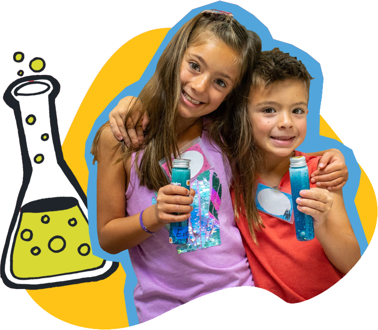titlebar-volunteer-kids Child at SDCDM looking at camera while holding test tube experiments