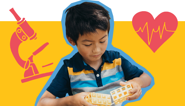 Child at SDCDM playing with blocks