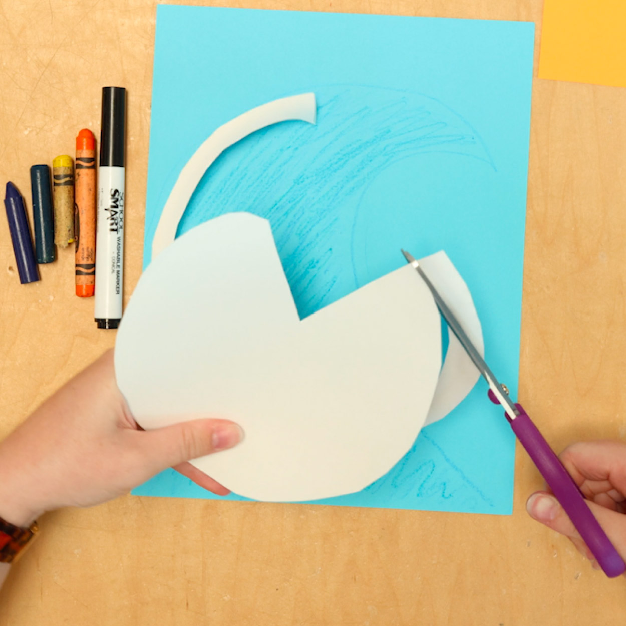 Cut paper plate to form seagull