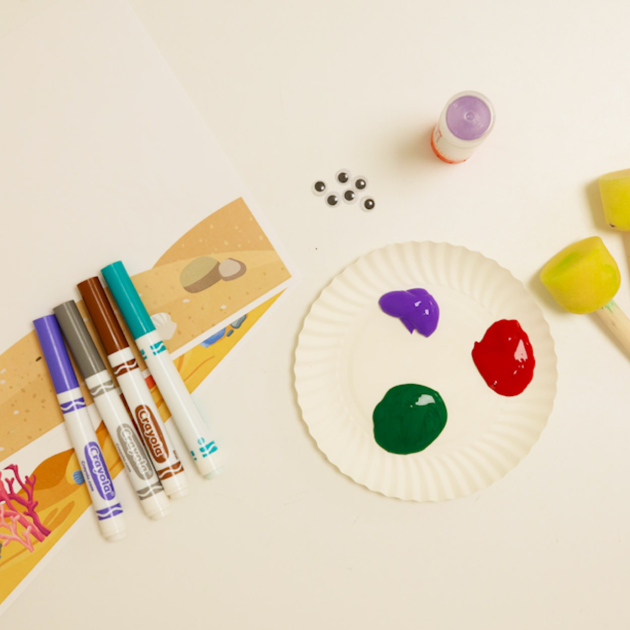 Pour paint onto paper plate