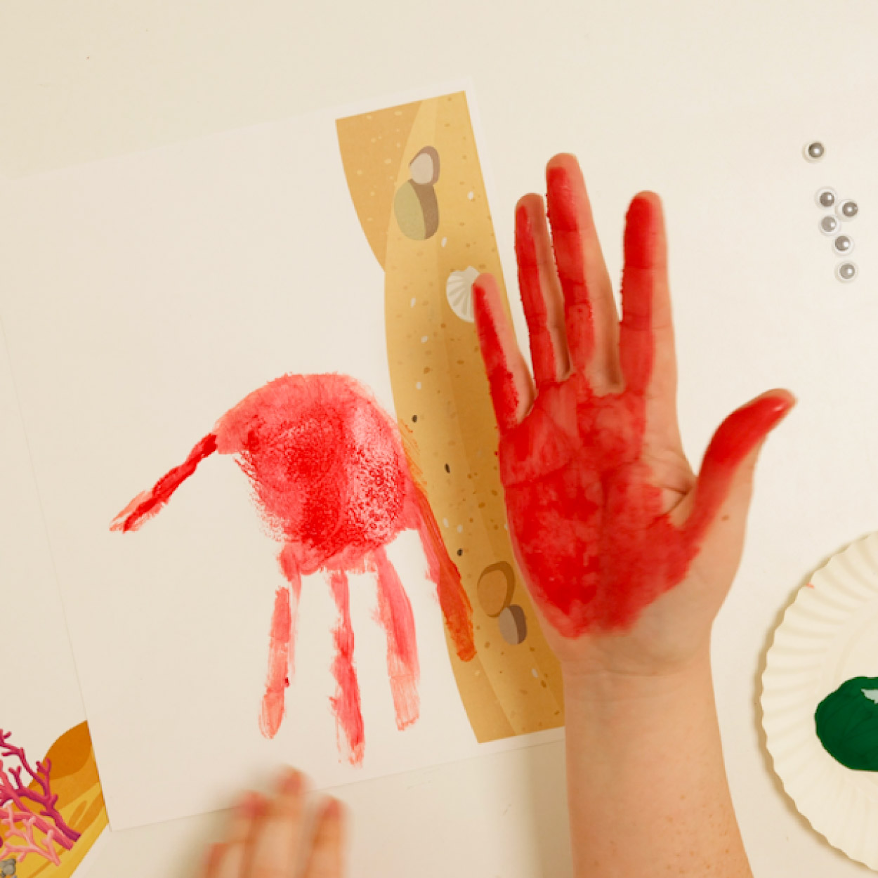 Paint hand and press it horizontally onto your paper
