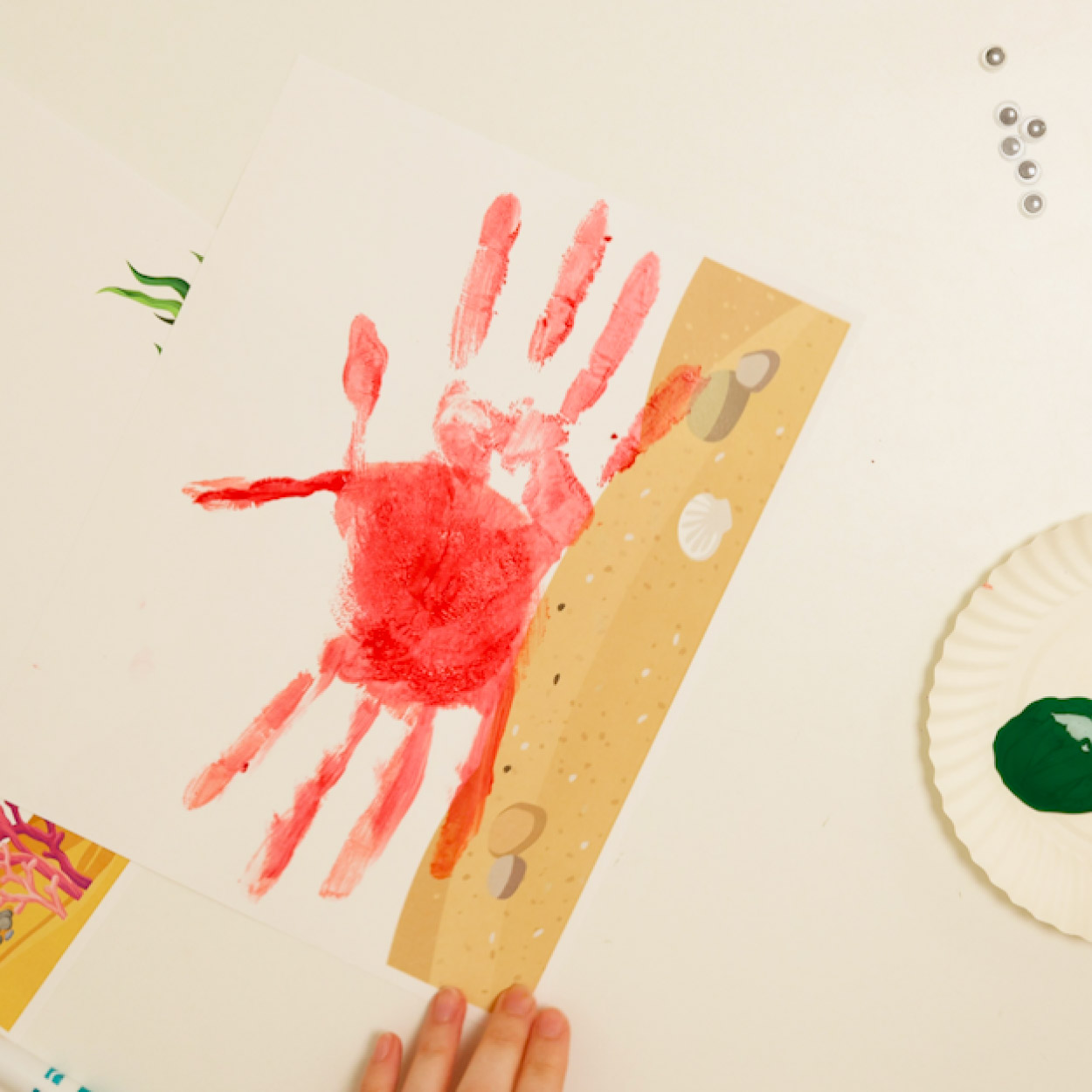 Place down a second handprint opposite of your first
